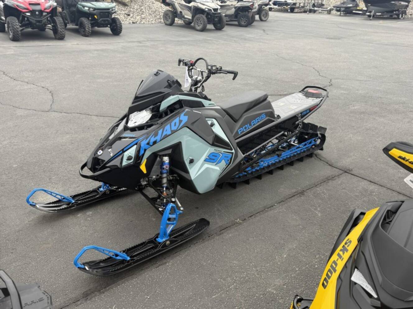 A photo of this 2026 Polaris Patriot 9R RMK Khaos 155 Premium Sagebrush Green Met / 