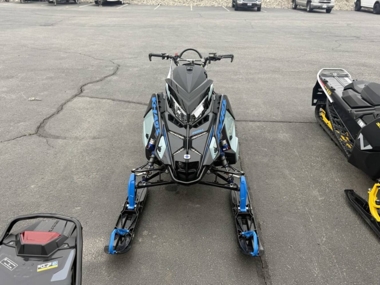 A photo of this 2026 Polaris Patriot 9R RMK Khaos 155 Premium Sagebrush Green Met / 