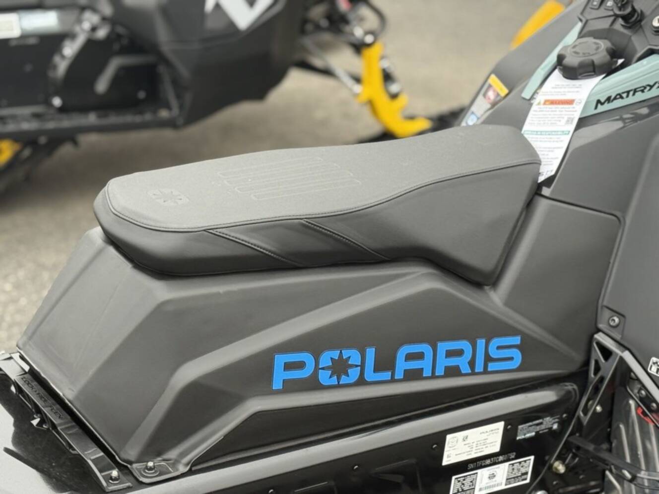 A photo of this 2026 Polaris Patriot 9R RMK Khaos 155 Premium Sagebrush Green Met / 