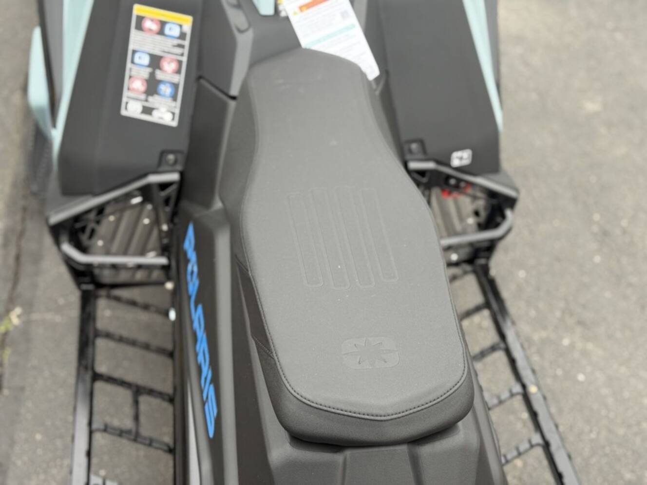 A photo of this 2026 Polaris Patriot 9R RMK Khaos 155 Premium Sagebrush Green Met / 
