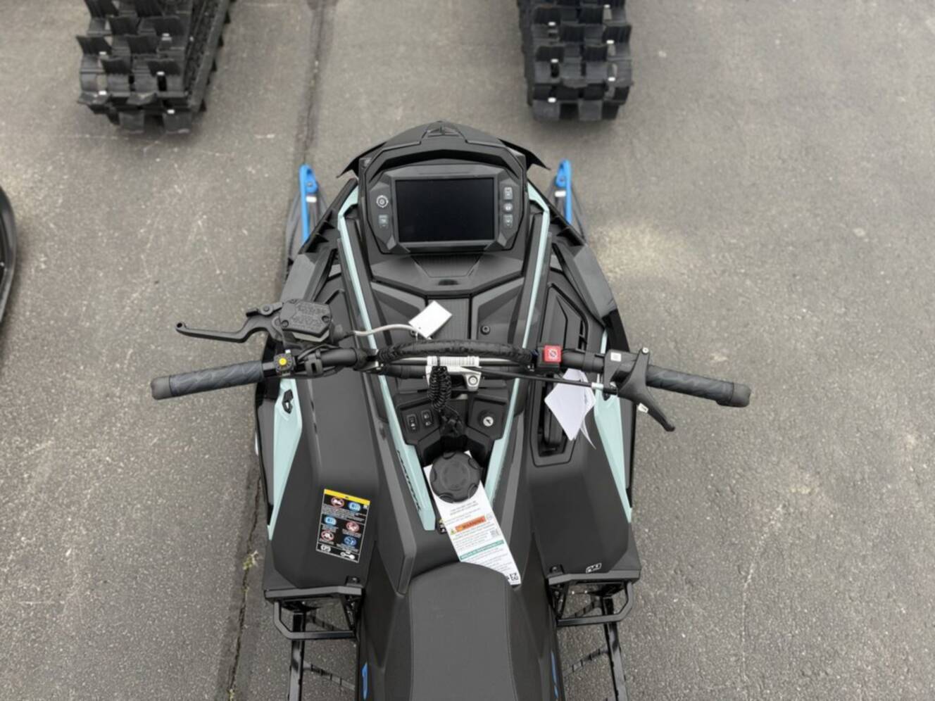 A photo of this 2026 Polaris Patriot 9R RMK Khaos 155 Premium Sagebrush Green Met / 