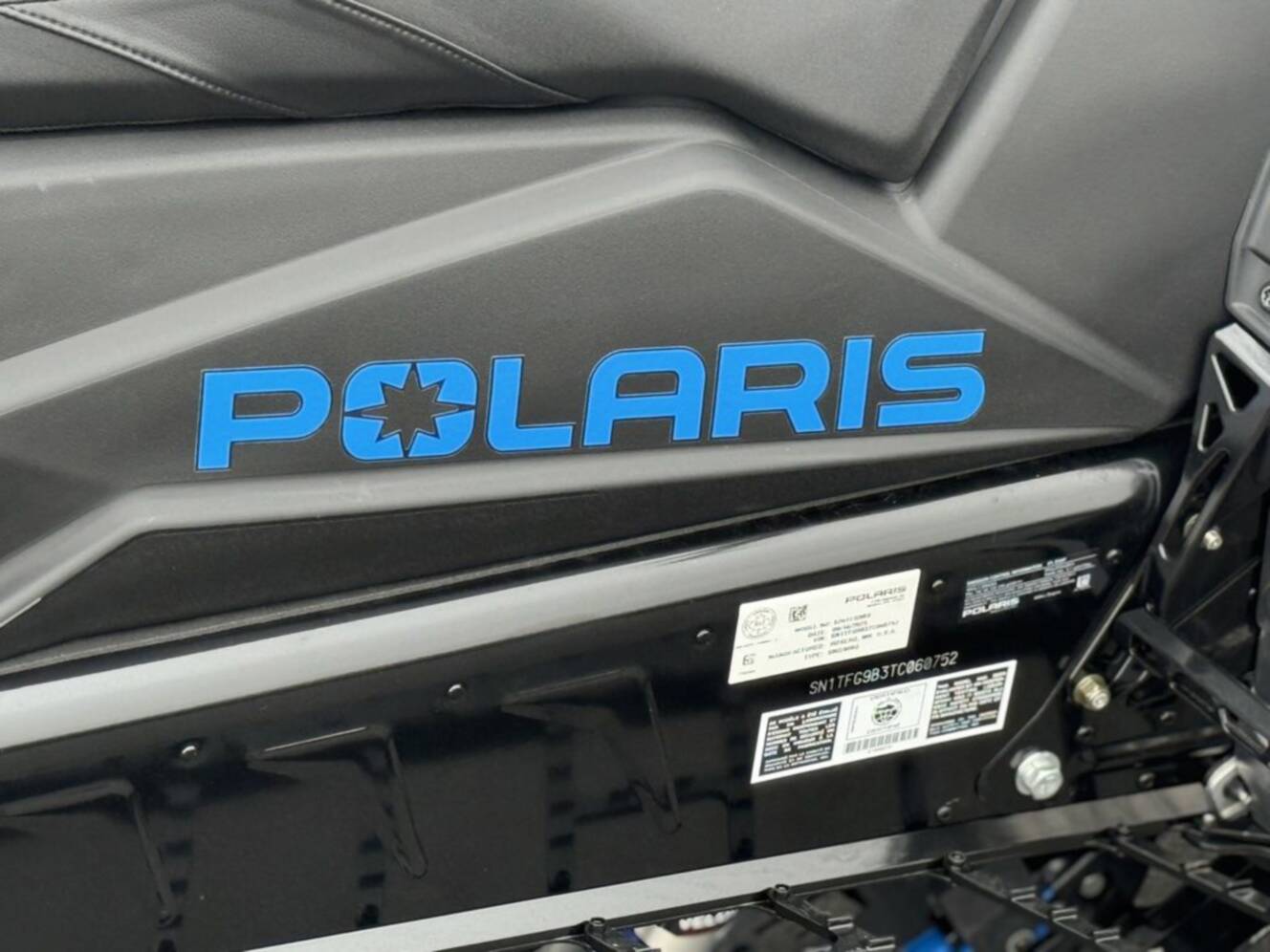 A photo of this 2026 Polaris Patriot 9R RMK Khaos 155 Premium Sagebrush Green Met / 