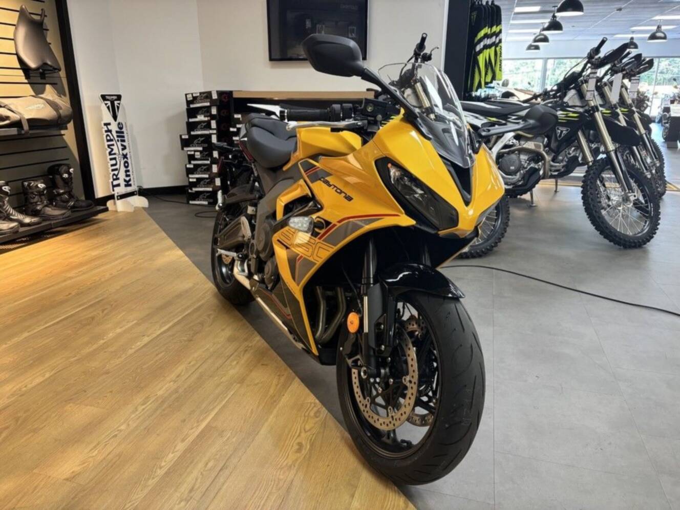 A photo of this 2026 Triumph Daytona 660 Cosmic Yellow / Sapphire Black