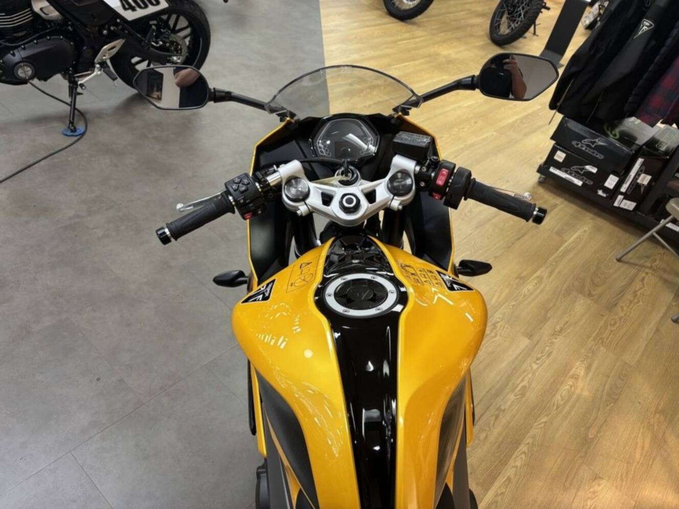 A photo of this 2026 Triumph Daytona 660 Cosmic Yellow / Sapphire Black