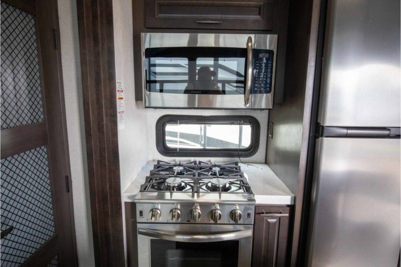 A photo of this 2023 Grand Design MOMENTUM 351MS