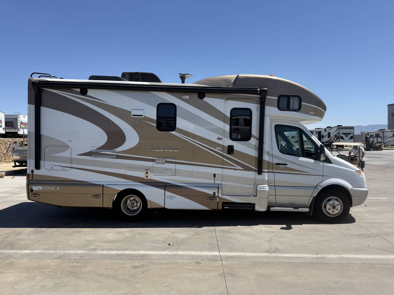 A photo of this 2013 Itasca Navion 24J