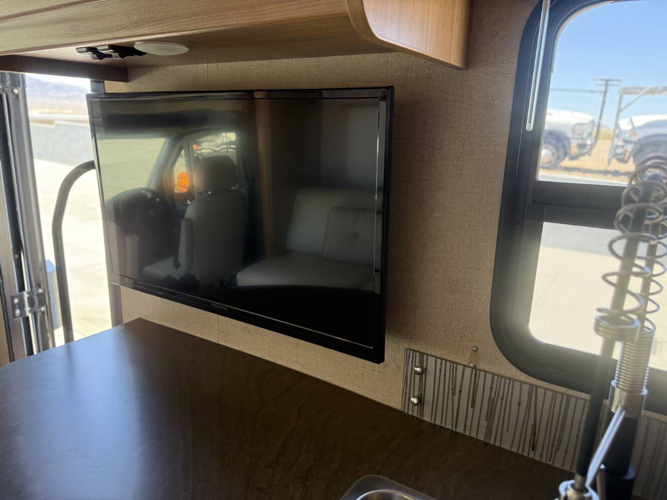 A photo of this 2013 Itasca Navion 24J
