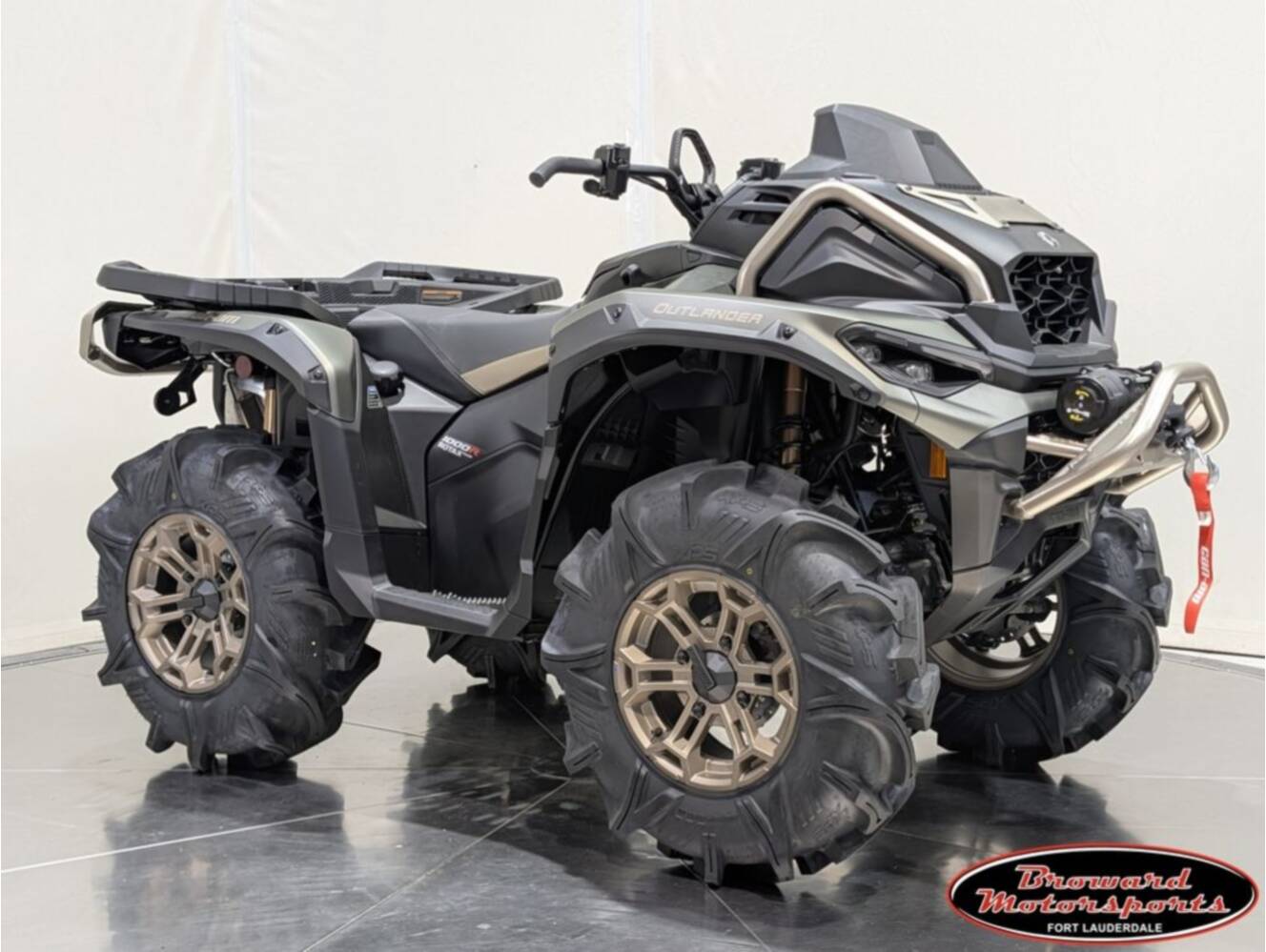 A photo of this 2026 Can-Am Outlander X mr 1000R Loft Green Satin