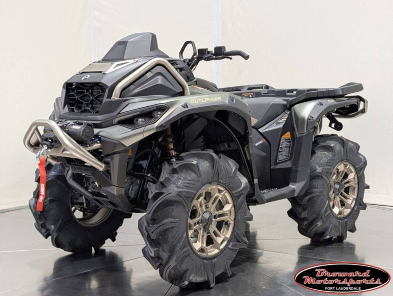 A photo of this 2026 Can-Am Outlander X mr 1000R Loft Green Satin