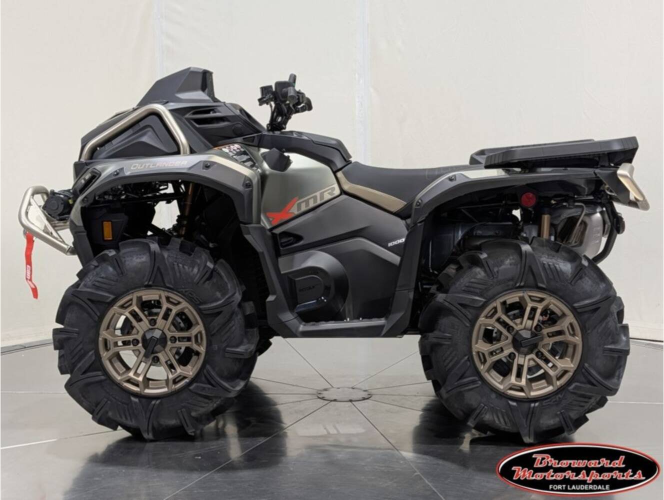 A photo of this 2026 Can-Am Outlander X mr 1000R Loft Green Satin