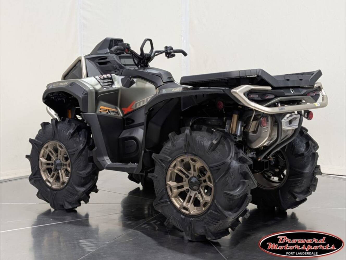 A photo of this 2026 Can-Am Outlander X mr 1000R Loft Green Satin