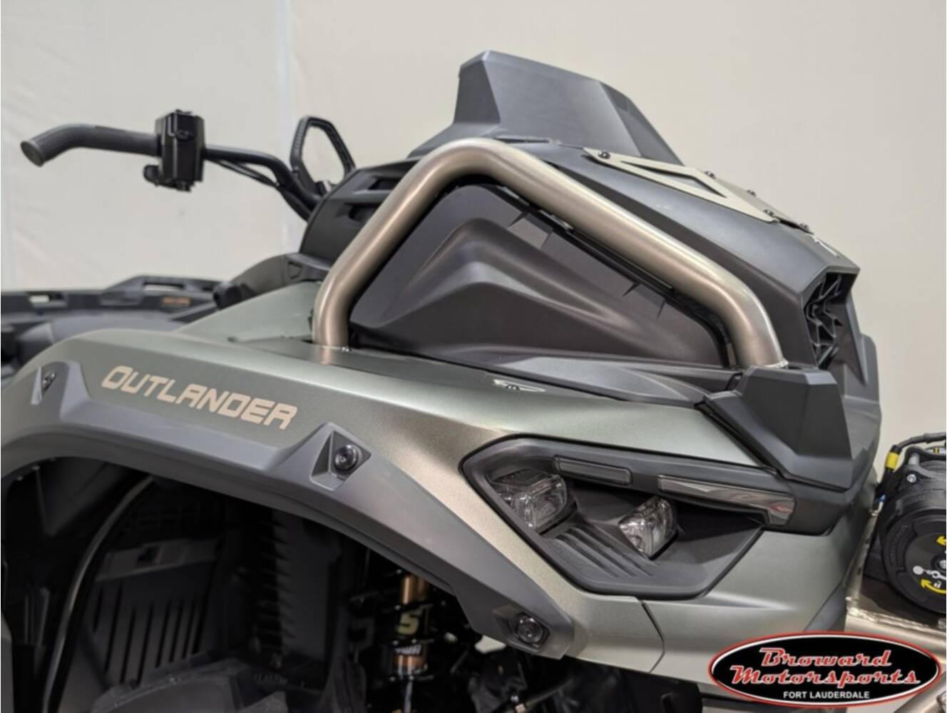 A photo of this 2026 Can-Am Outlander X mr 1000R Loft Green Satin