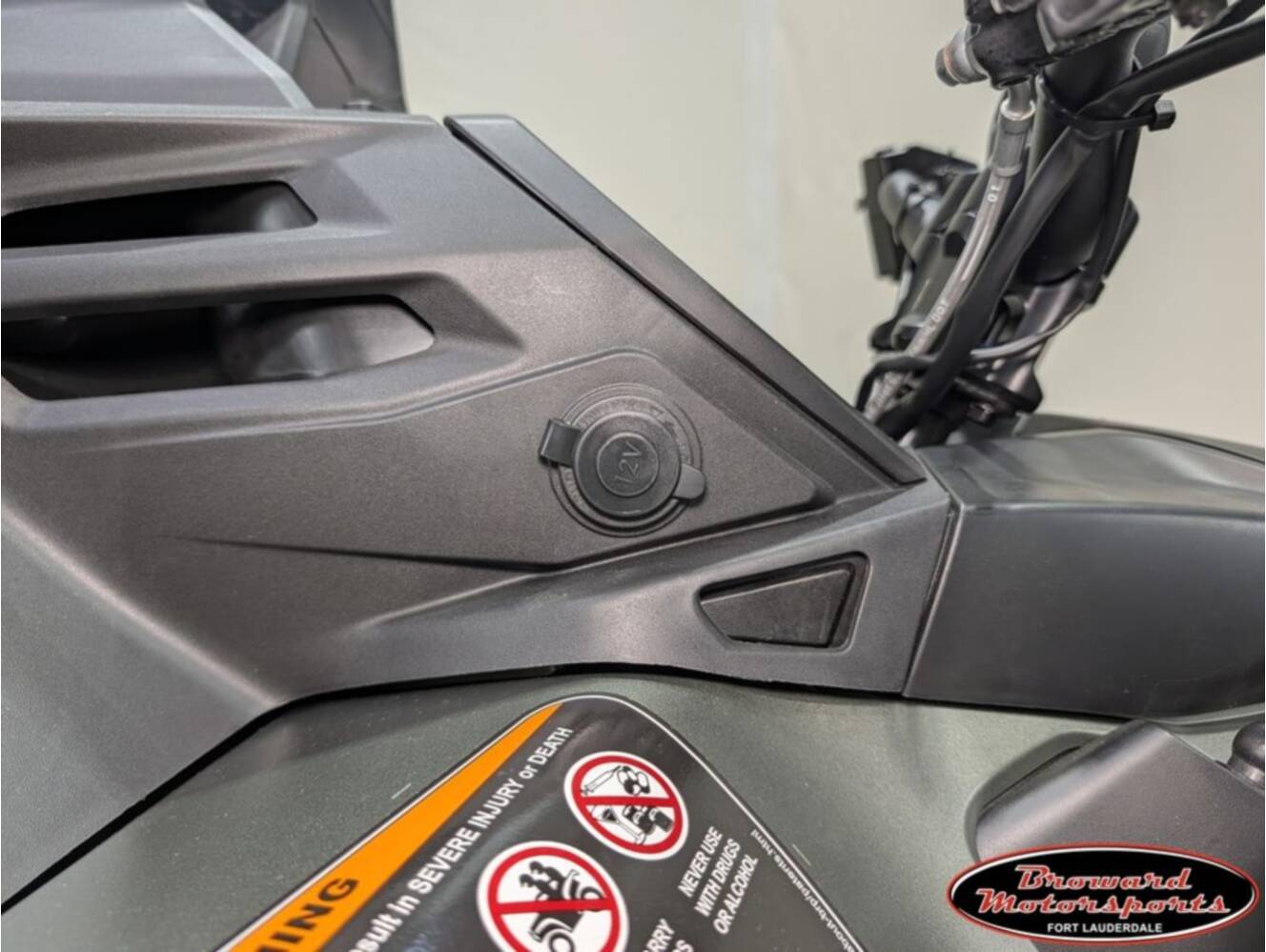 A photo of this 2026 Can-Am Outlander X mr 1000R Loft Green Satin