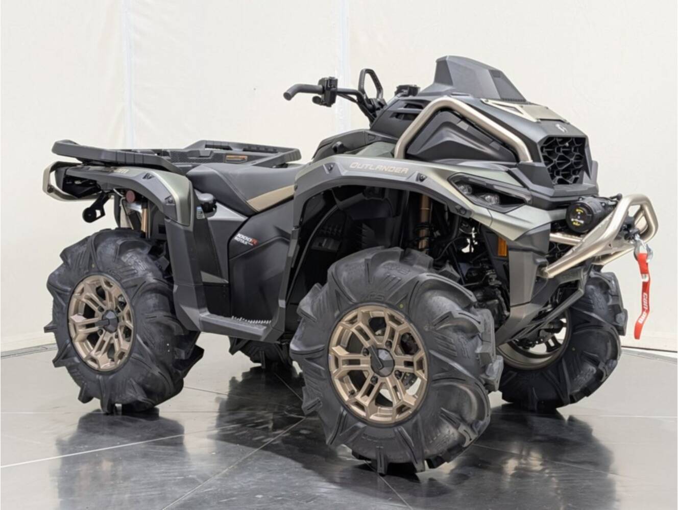 A photo of this 2026 Can-Am Outlander X mr 1000R Loft Green Satin