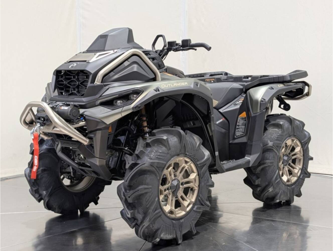 A photo of this 2026 Can-Am Outlander X mr 1000R Loft Green Satin