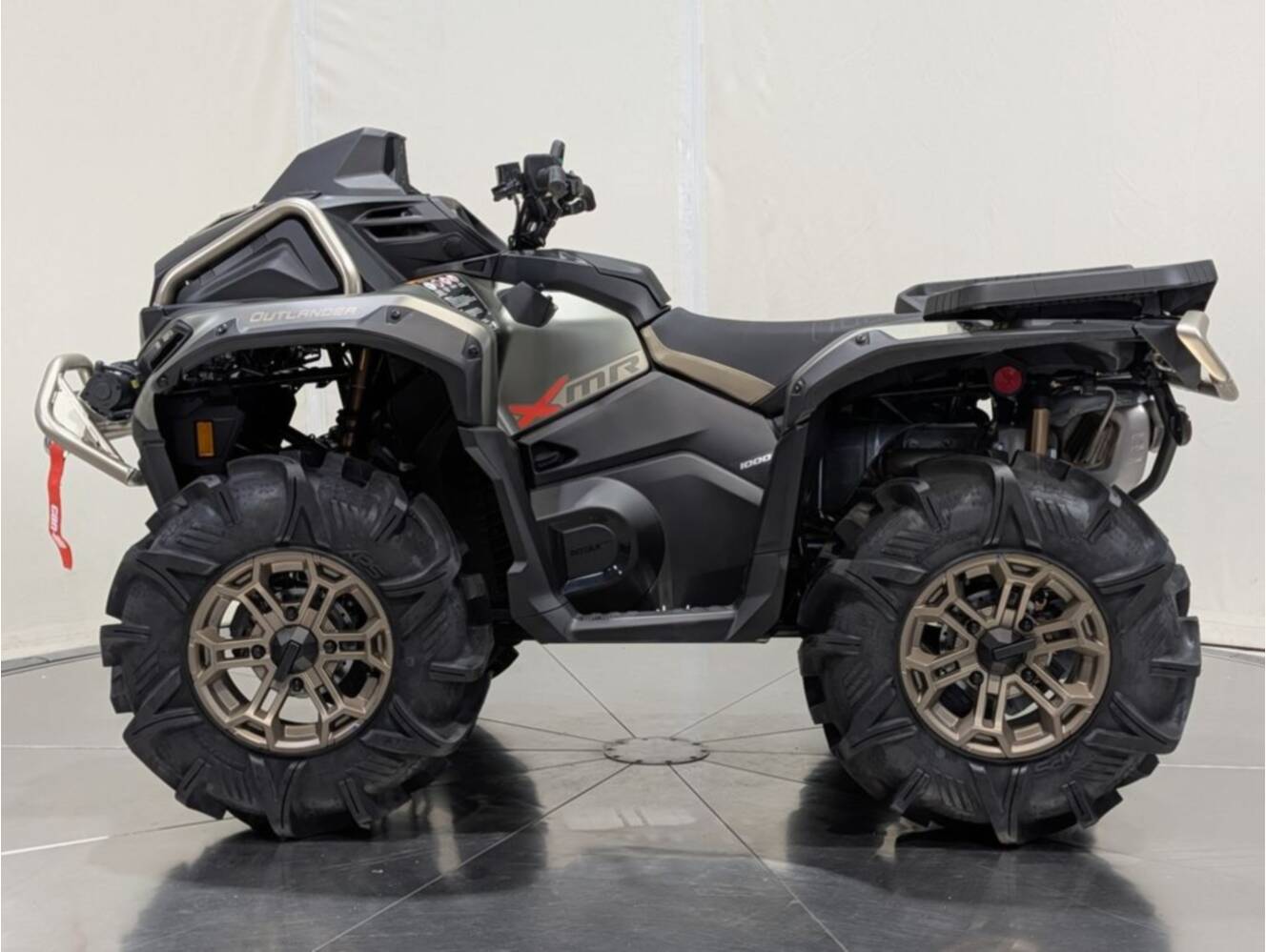 A photo of this 2026 Can-Am Outlander X mr 1000R Loft Green Satin