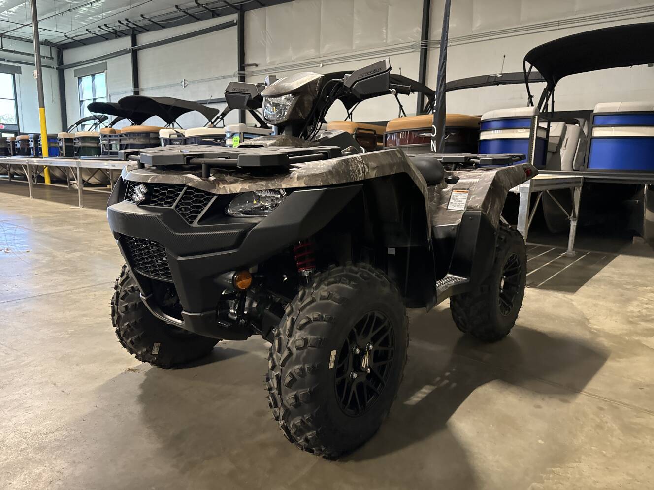A photo of this 2026 Suzuki KingQuad 750AXi Power Steering SE Camo