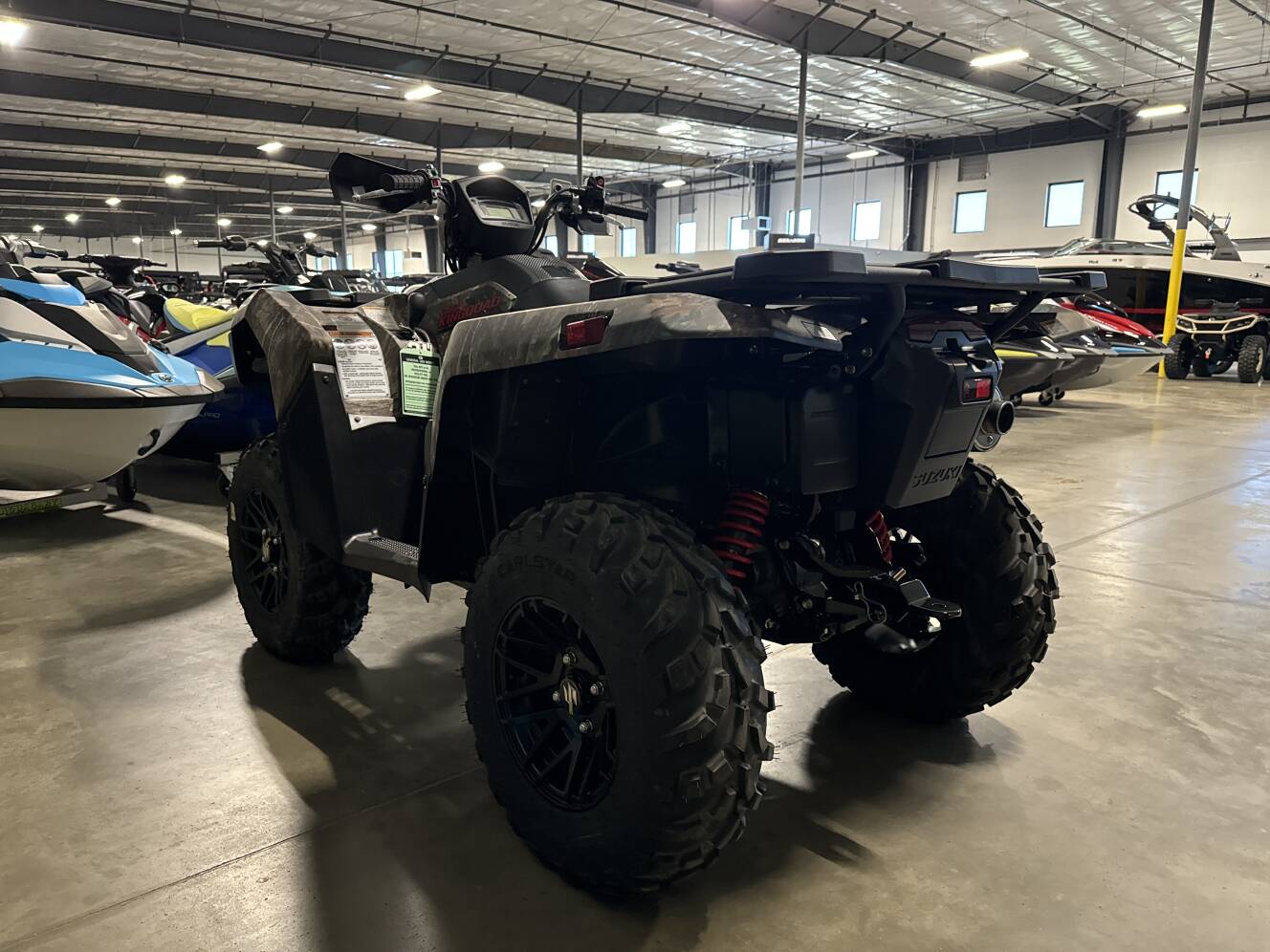 A photo of this 2026 Suzuki KingQuad 750AXi Power Steering SE Camo