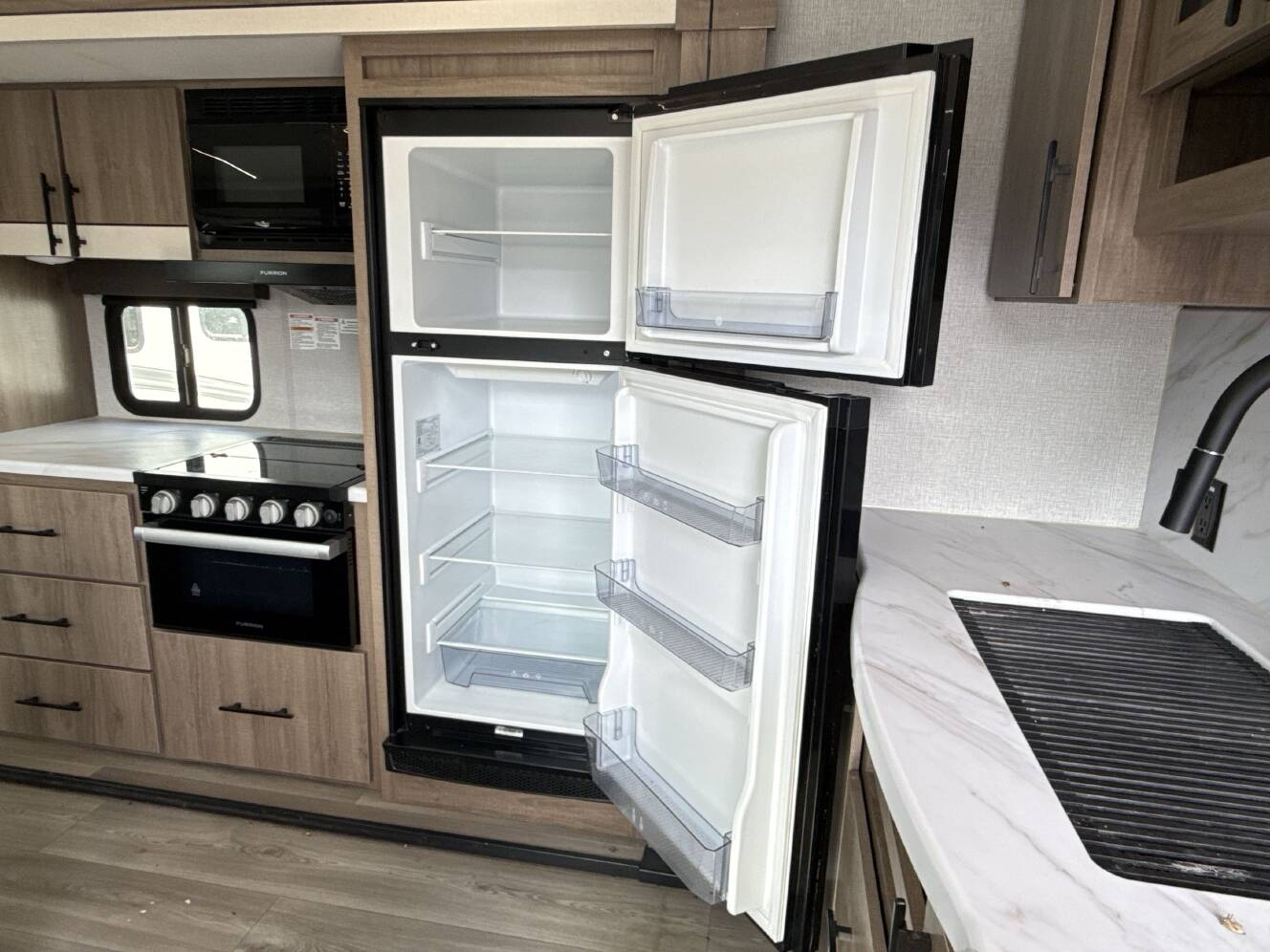 A photo of this 2024 Grand Design IMAGINE 3100RD