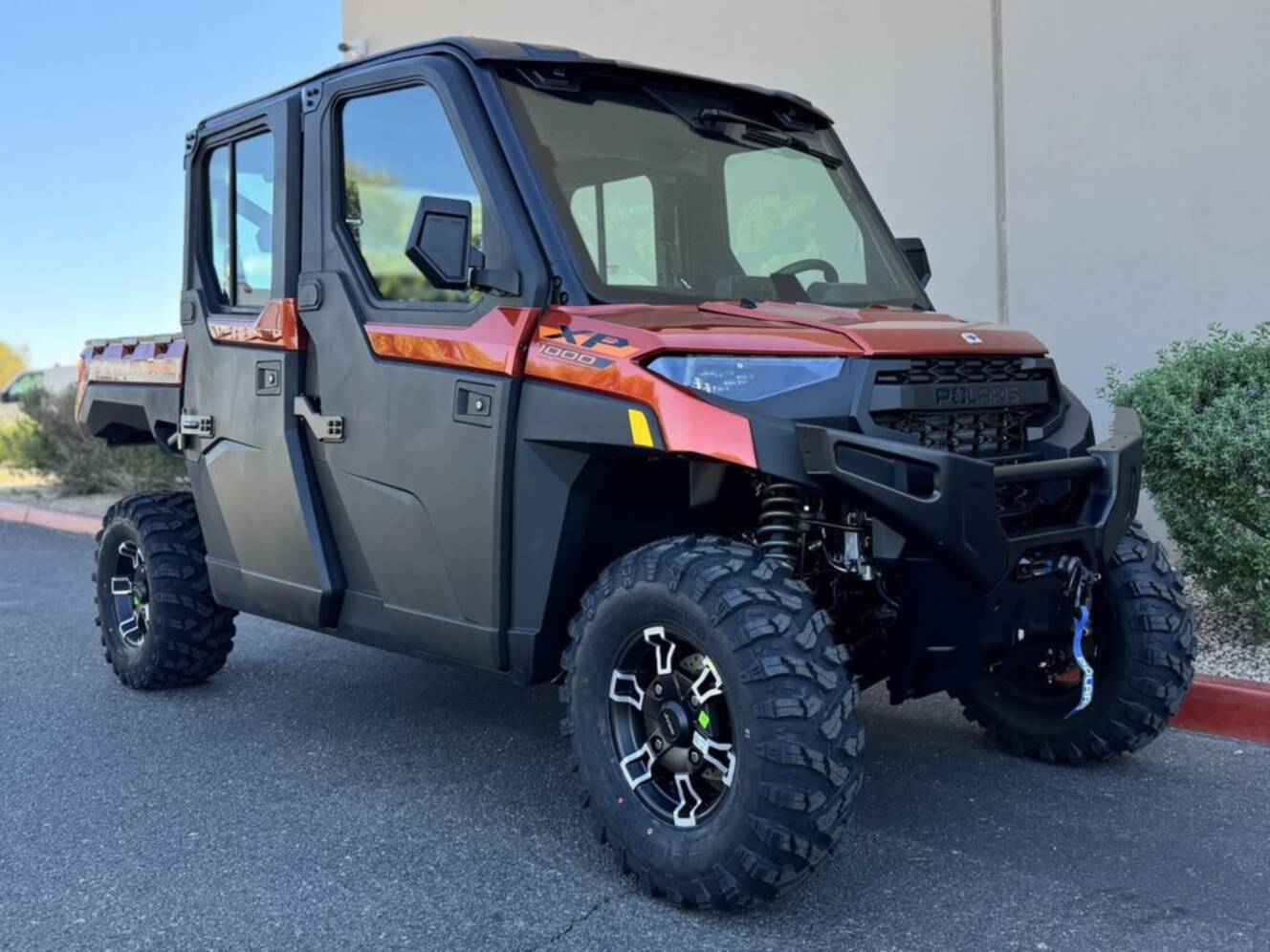 A photo of this 2026 Polaris Ranger Crew XP 1000 NorthStar Edition Ultimate Orange R