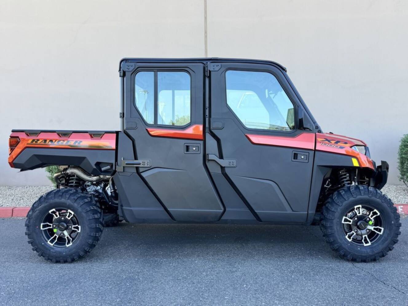A photo of this 2026 Polaris Ranger Crew XP 1000 NorthStar Edition Ultimate Orange R