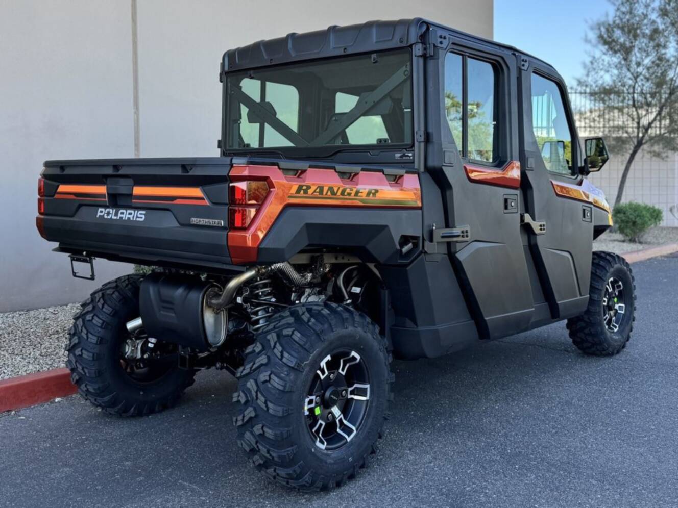A photo of this 2026 Polaris Ranger Crew XP 1000 NorthStar Edition Ultimate Orange R