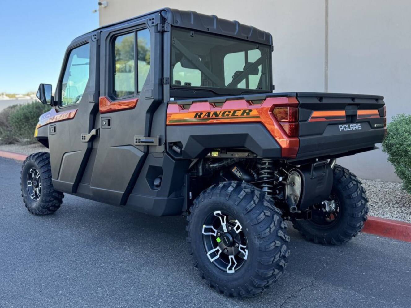 A photo of this 2026 Polaris Ranger Crew XP 1000 NorthStar Edition Ultimate Orange R