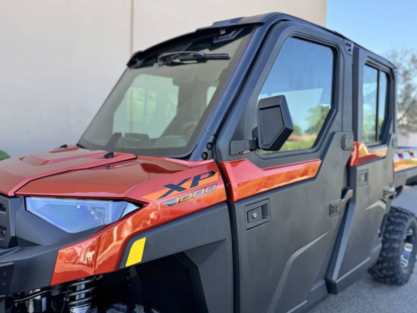 A photo of this 2026 Polaris Ranger Crew XP 1000 NorthStar Edition Ultimate Orange R