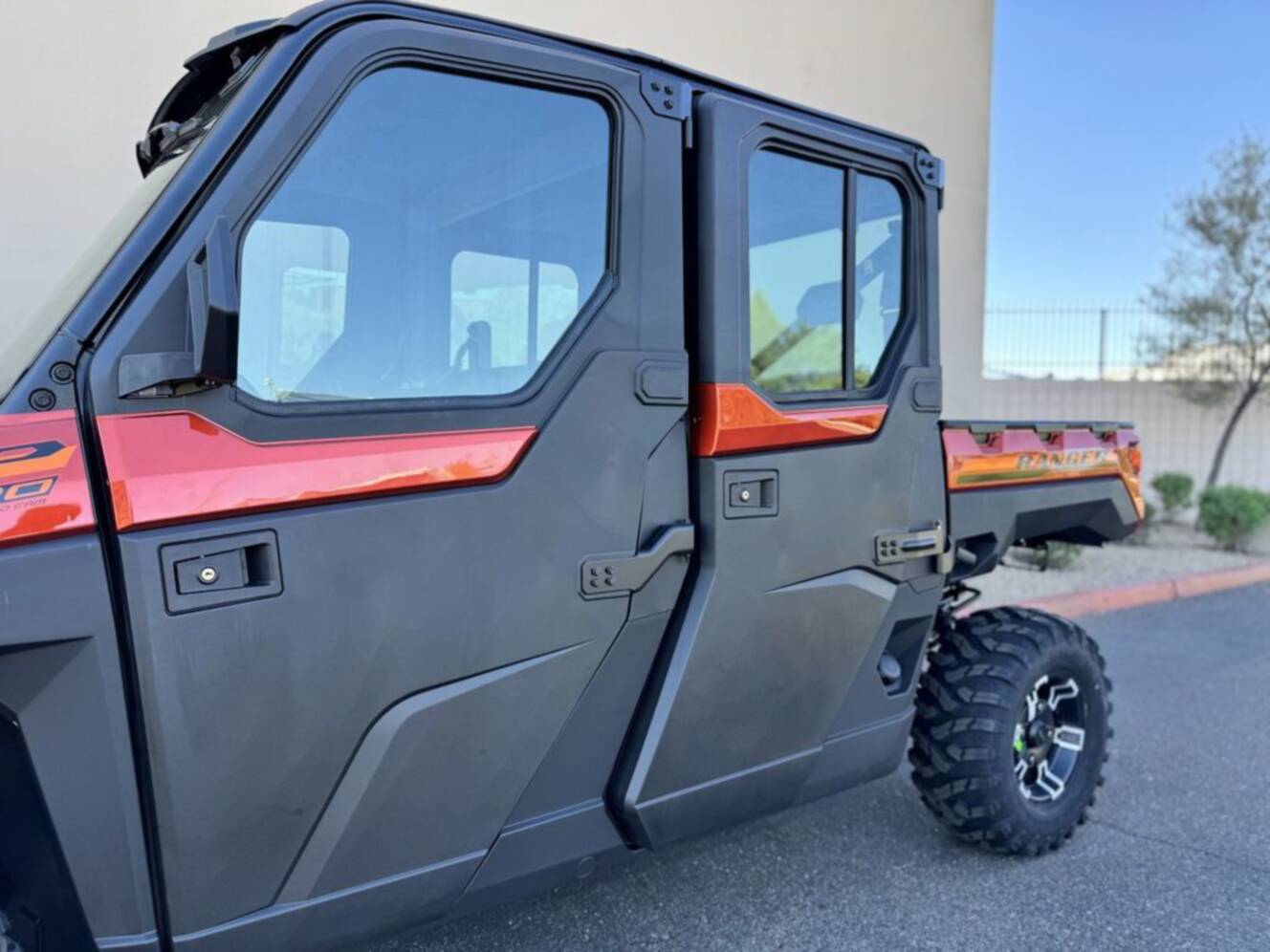 A photo of this 2026 Polaris Ranger Crew XP 1000 NorthStar Edition Ultimate Orange R