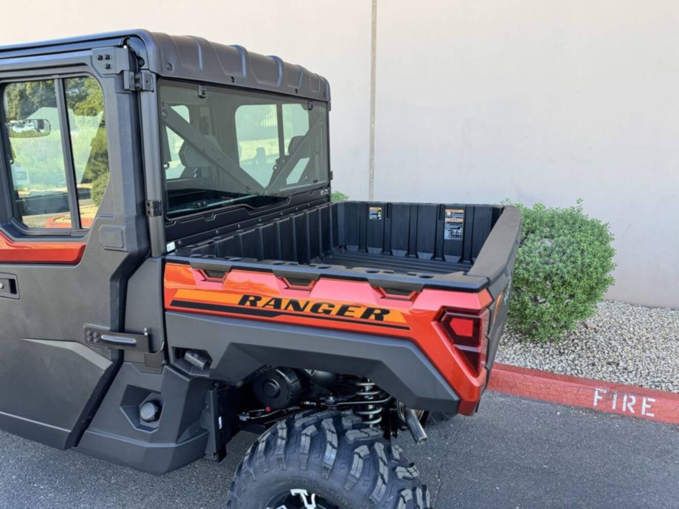 A photo of this 2026 Polaris Ranger Crew XP 1000 NorthStar Edition Ultimate Orange R