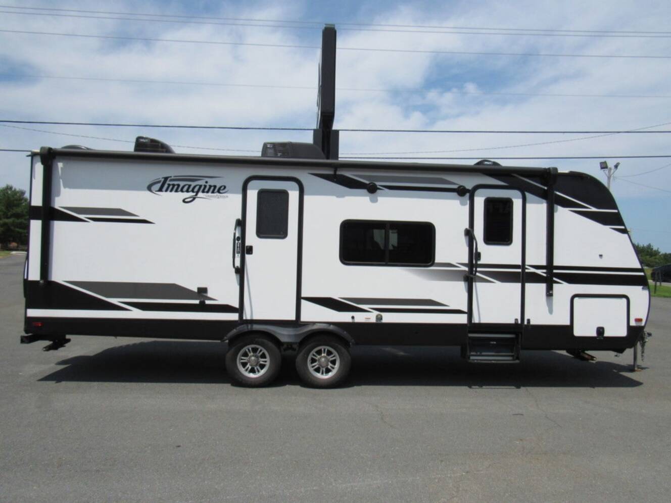 A photo of this 2021 Grand Design Imagine 2610ML