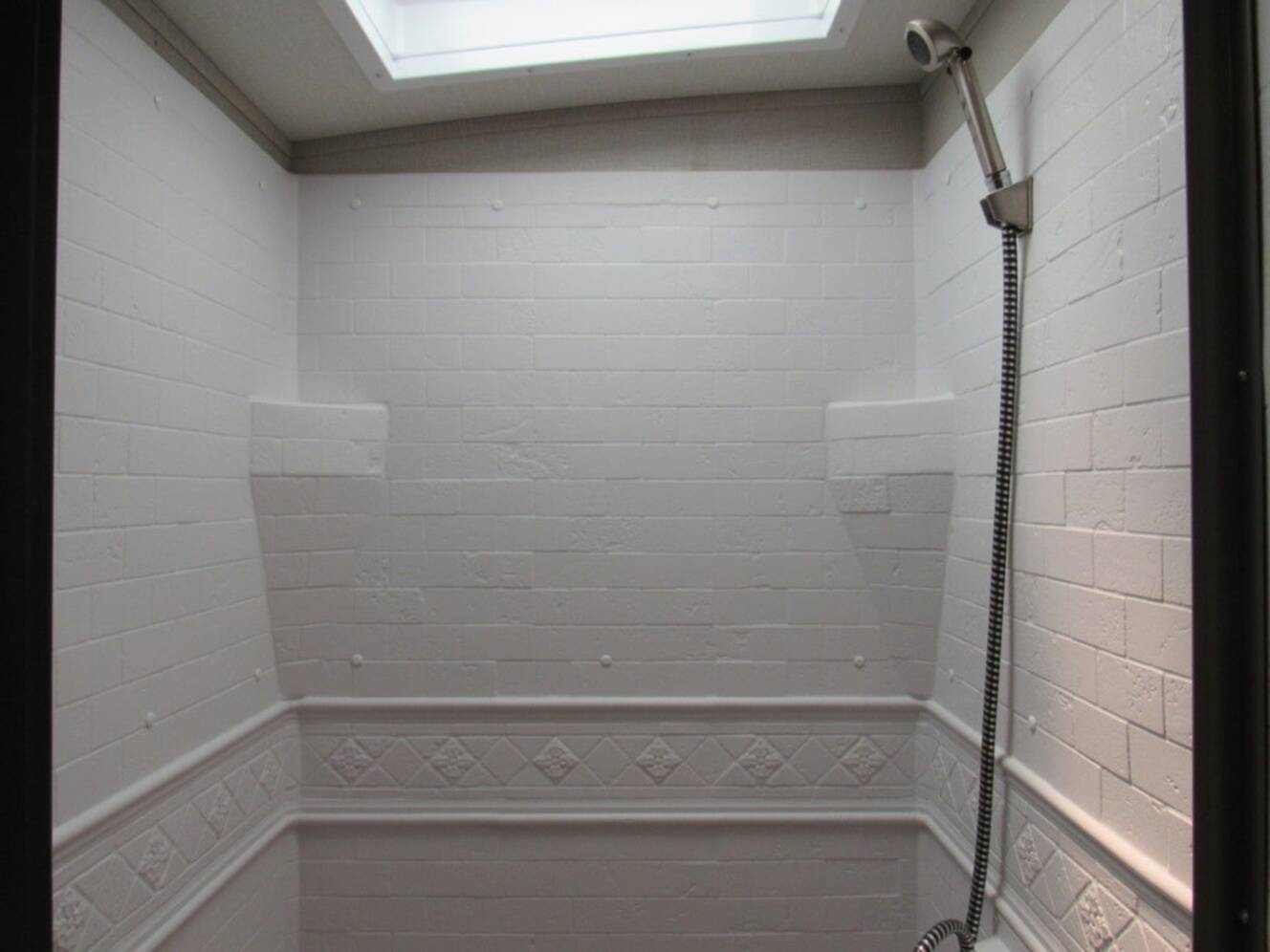 A photo of this 2021 Grand Design Imagine 2610ML