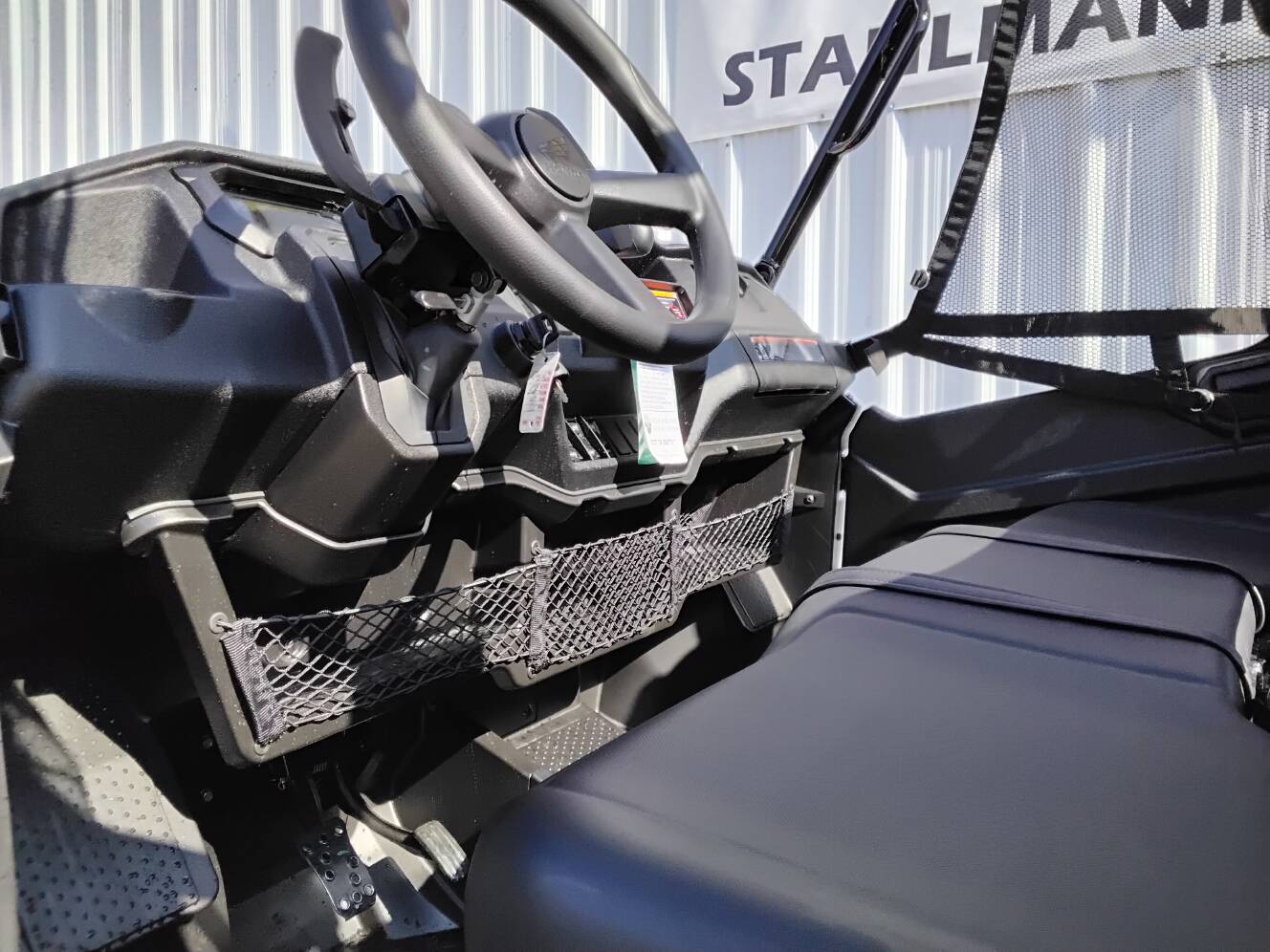 A photo of this 2025 Honda Pioneer 1000-6 Crew Deluxe
