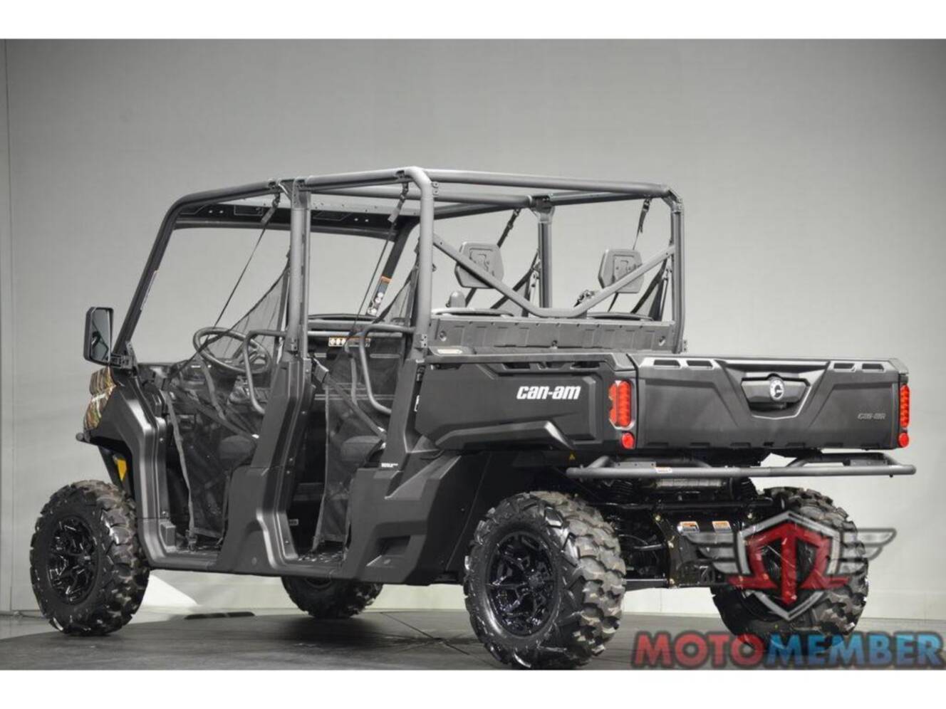 A photo of this 2026 Can-Am Defender MAX DPS HD7 Dark Wildland Camo