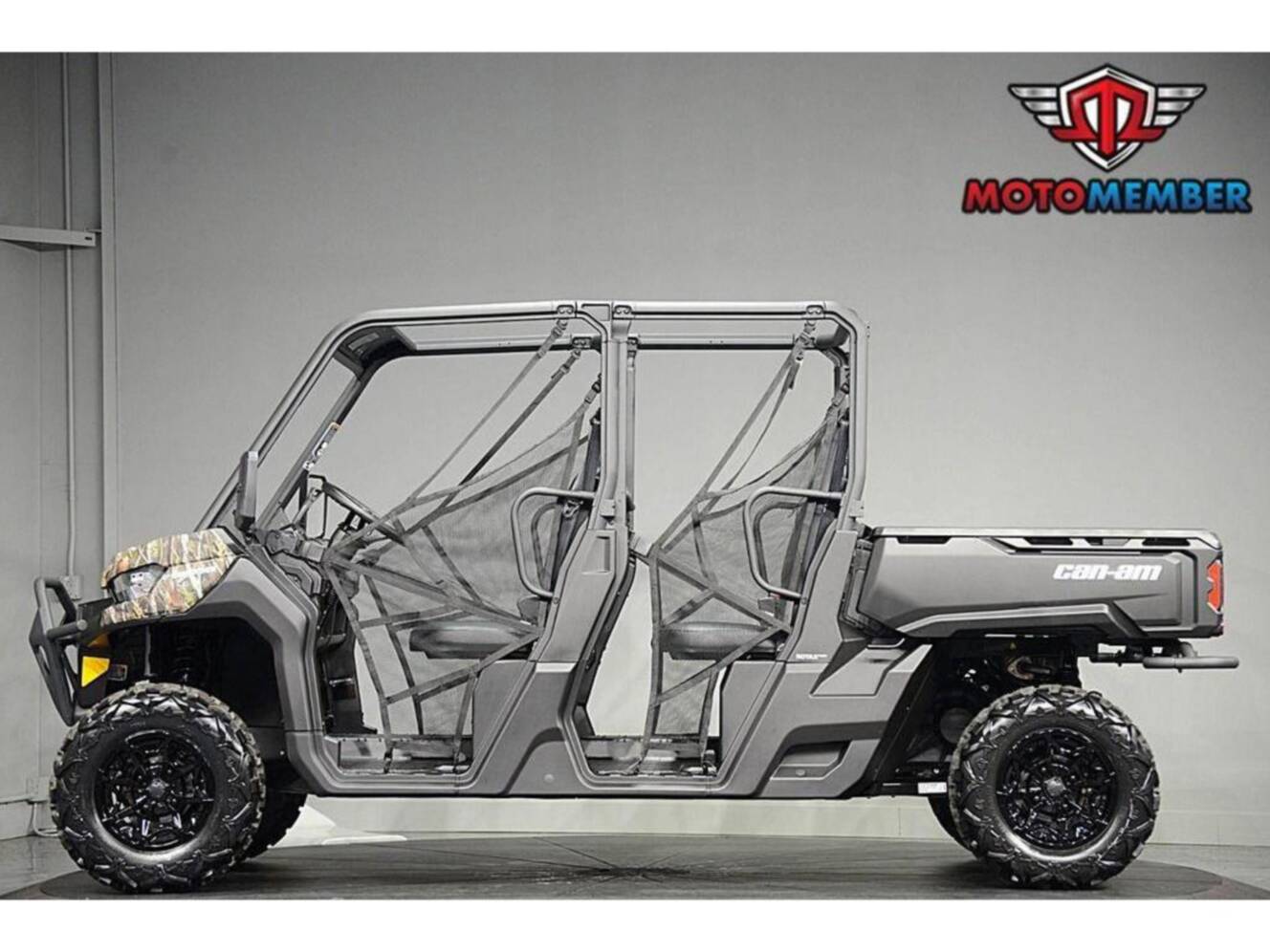 A photo of this 2026 Can-Am Defender MAX DPS HD7 Dark Wildland Camo