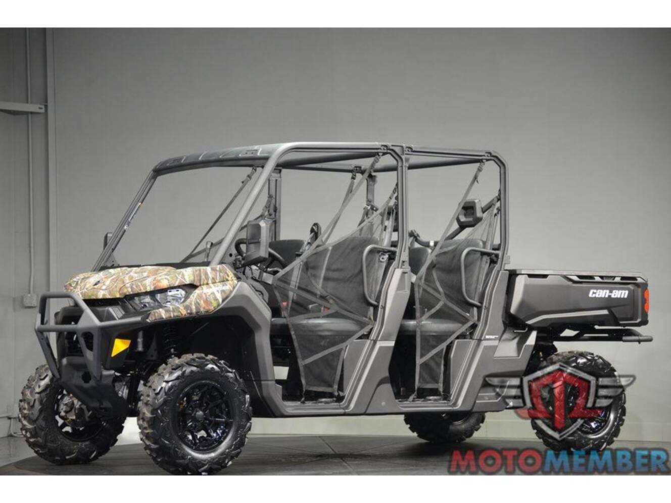A photo of this 2026 Can-Am Defender MAX DPS HD7 Dark Wildland Camo