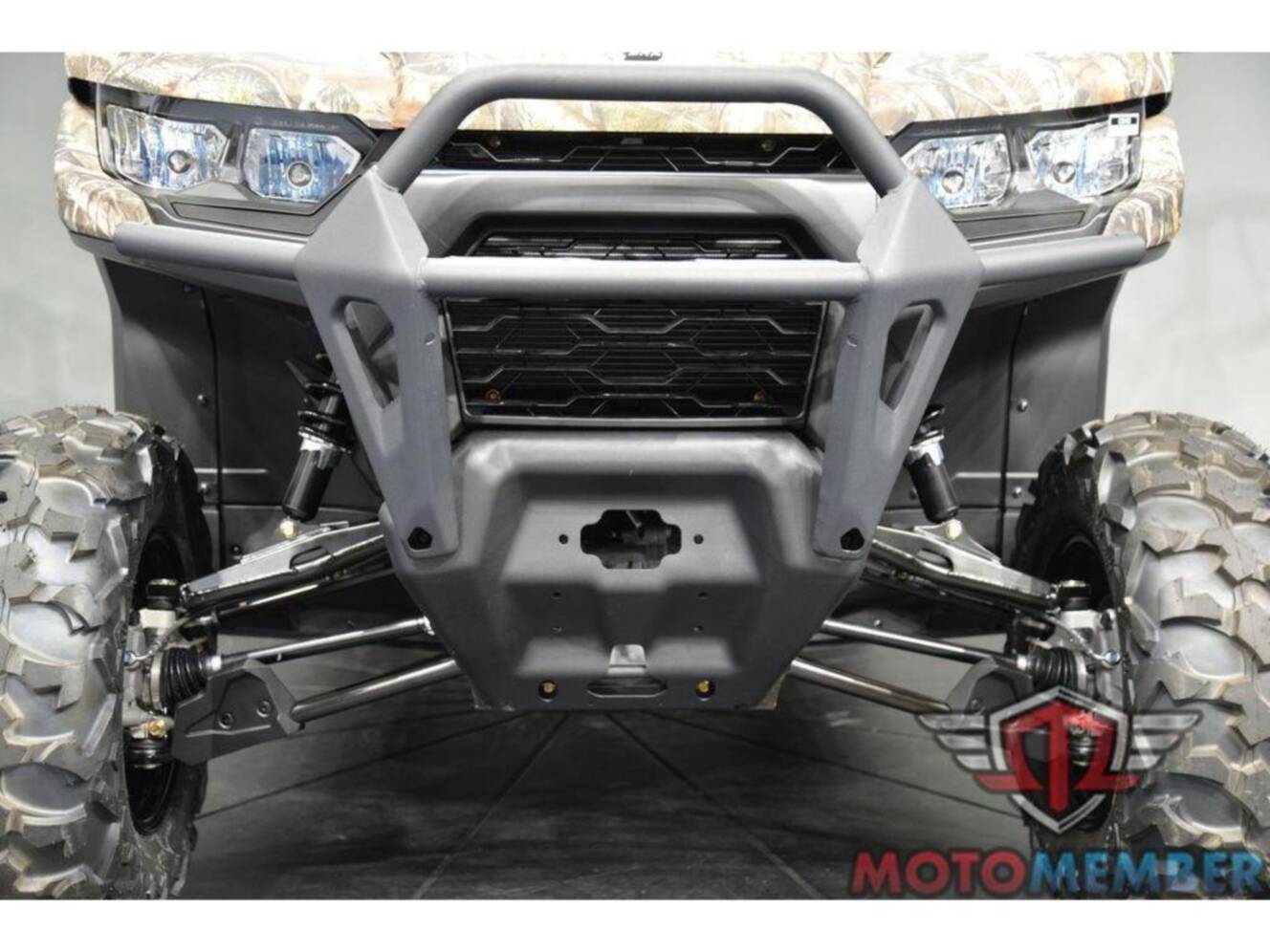 A photo of this 2026 Can-Am Defender MAX DPS HD7 Dark Wildland Camo