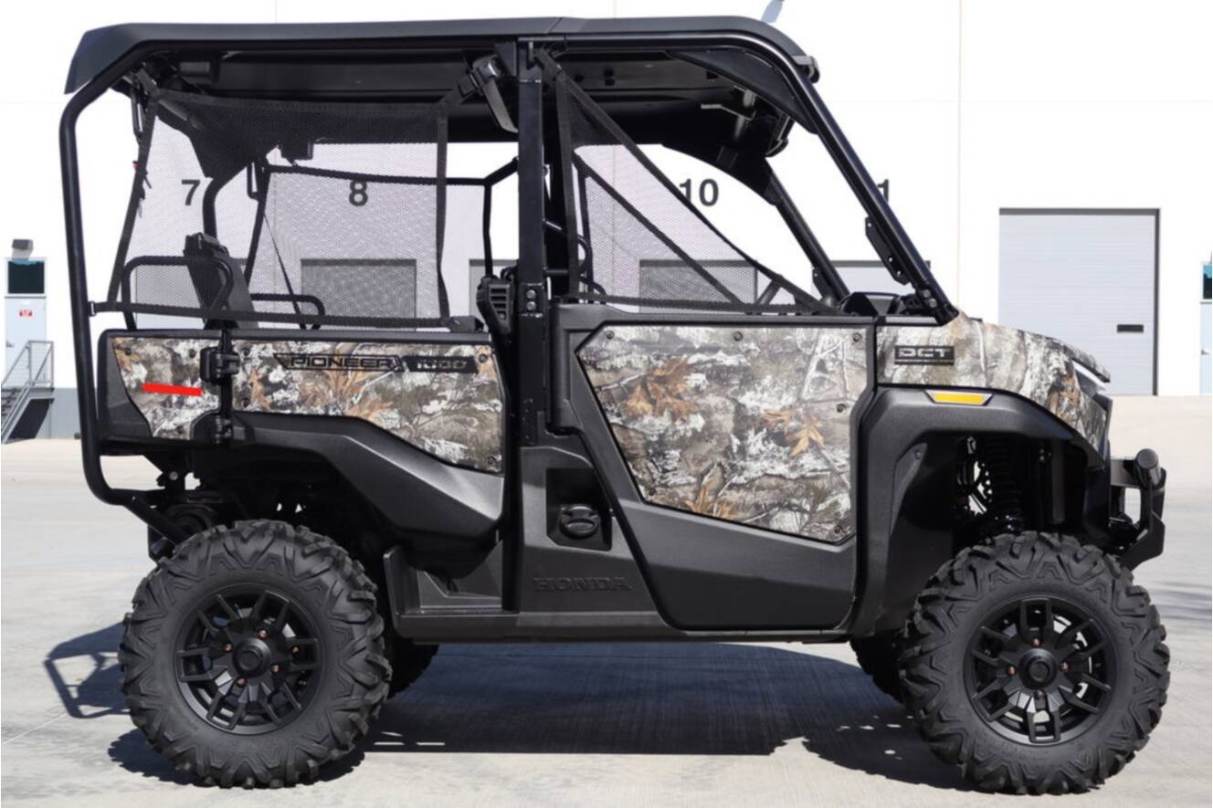 A photo of this 2026 Honda Pioneer 1000-5 Deluxe Truetimber Atera Camo