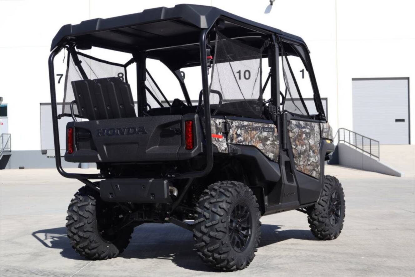 A photo of this 2026 Honda Pioneer 1000-5 Deluxe Truetimber Atera Camo