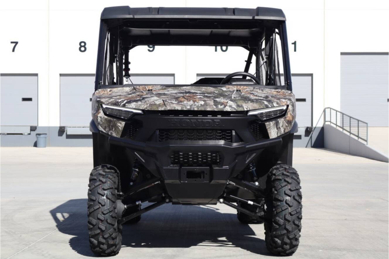 A photo of this 2026 Honda Pioneer 1000-5 Deluxe Truetimber Atera Camo