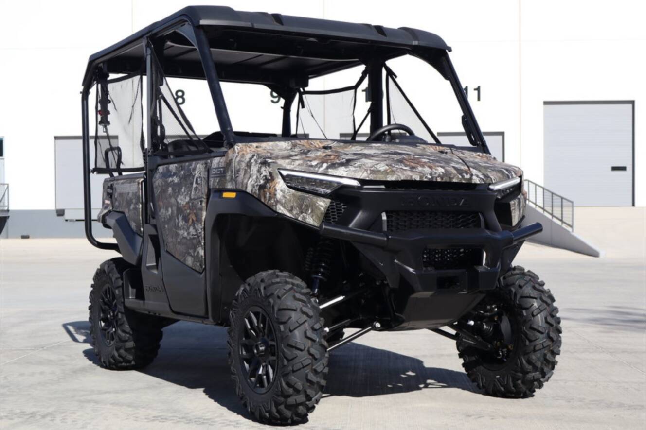 A photo of this 2026 Honda Pioneer 1000-5 Deluxe Truetimber Atera Camo
