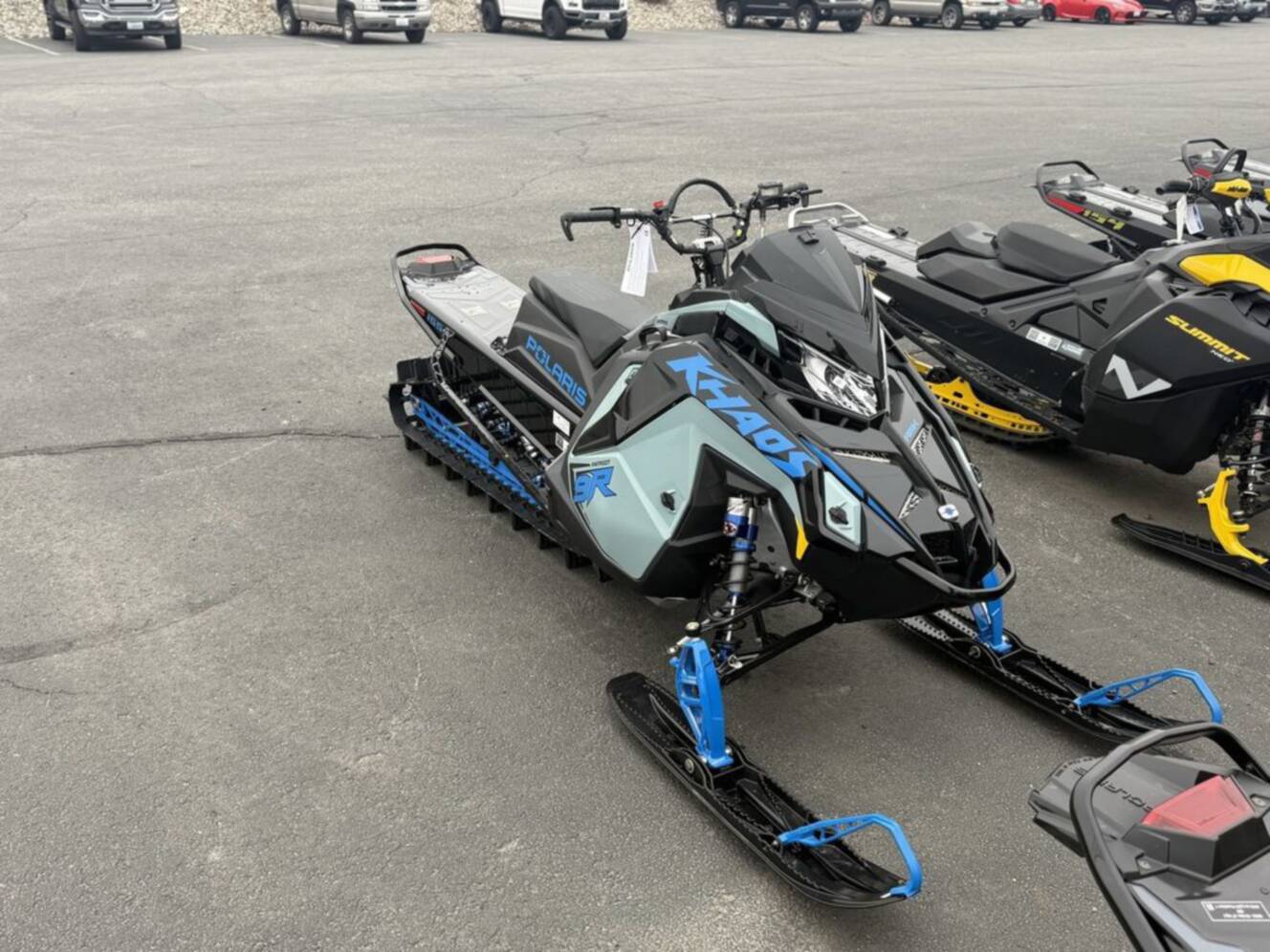 A photo of this 2026 Polaris Patriot 9R RMK Khaos 155 Premium Sagebrush Green Met / 