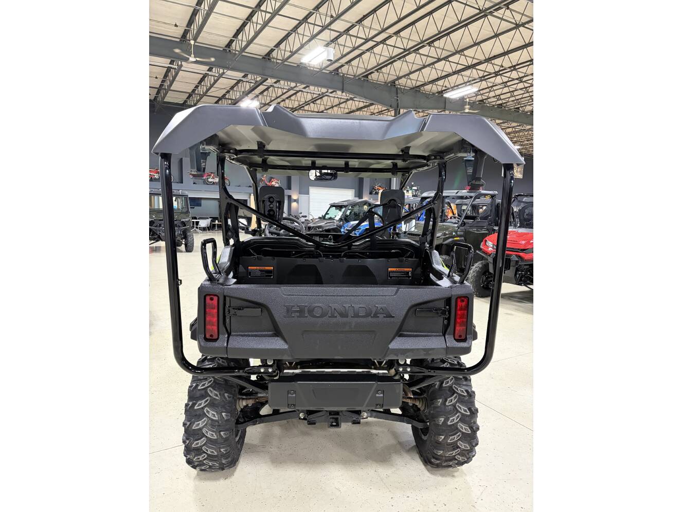 A photo of this 2023 Honda Pioneer 1000-5 Deluxe