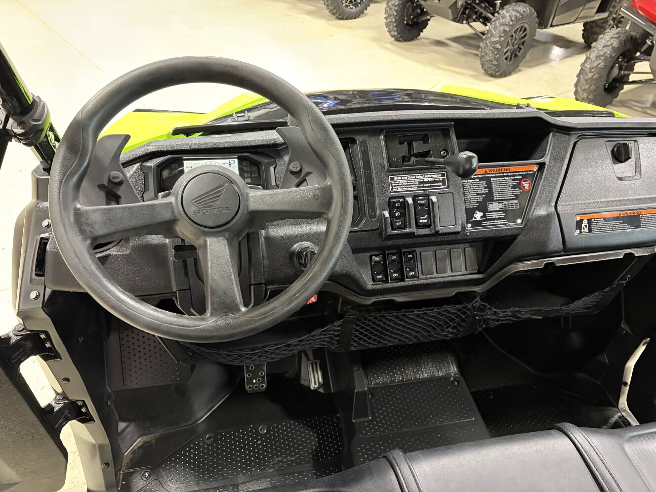 A photo of this 2023 Honda Pioneer 1000-5 Deluxe
