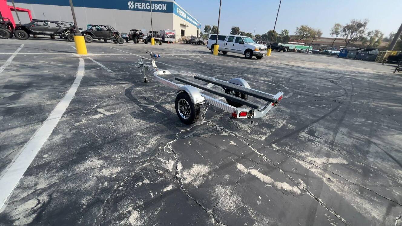 A photo of this 2026 Triton ELITE WCI PWC TRAILER W&sol; ALUMINUM WHEELS