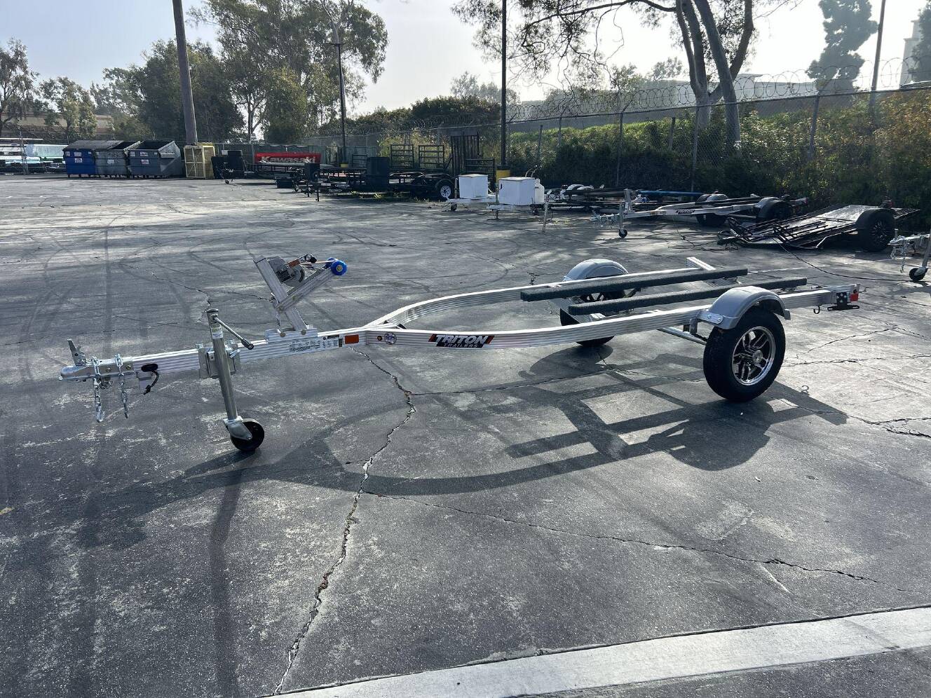 A photo of this 2026 Triton ELITE WCI PWC TRAILER W&sol; ALUMINUM WHEELS
