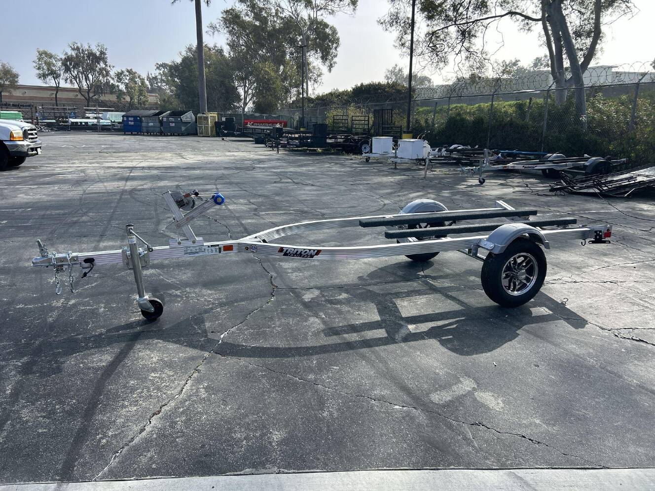 A photo of this 2026 Triton ELITE WCI PWC TRAILER W&sol; ALUMINUM WHEELS