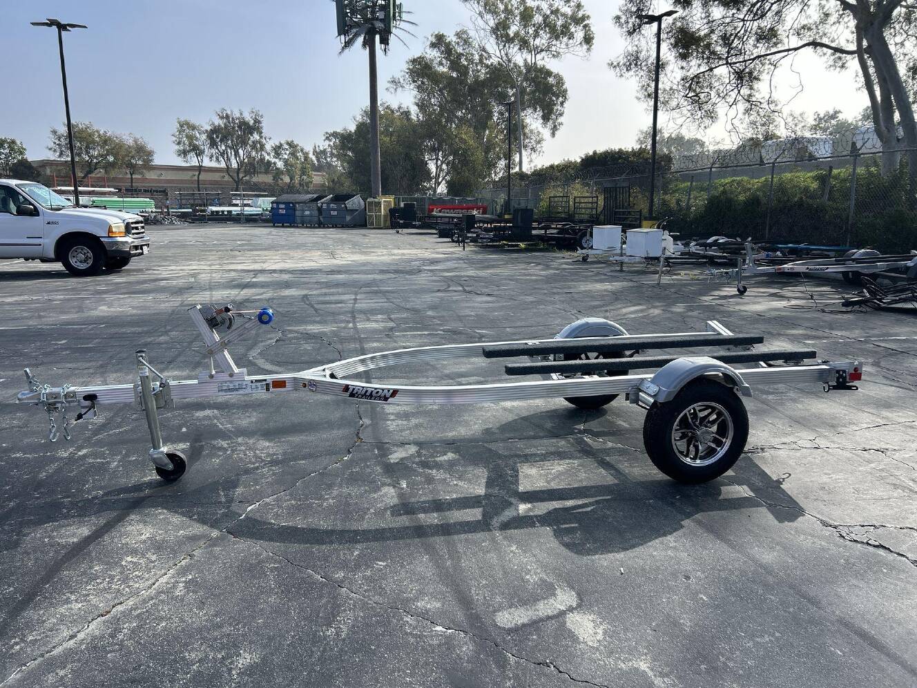 A photo of this 2026 Triton ELITE WCI PWC TRAILER W&sol; ALUMINUM WHEELS