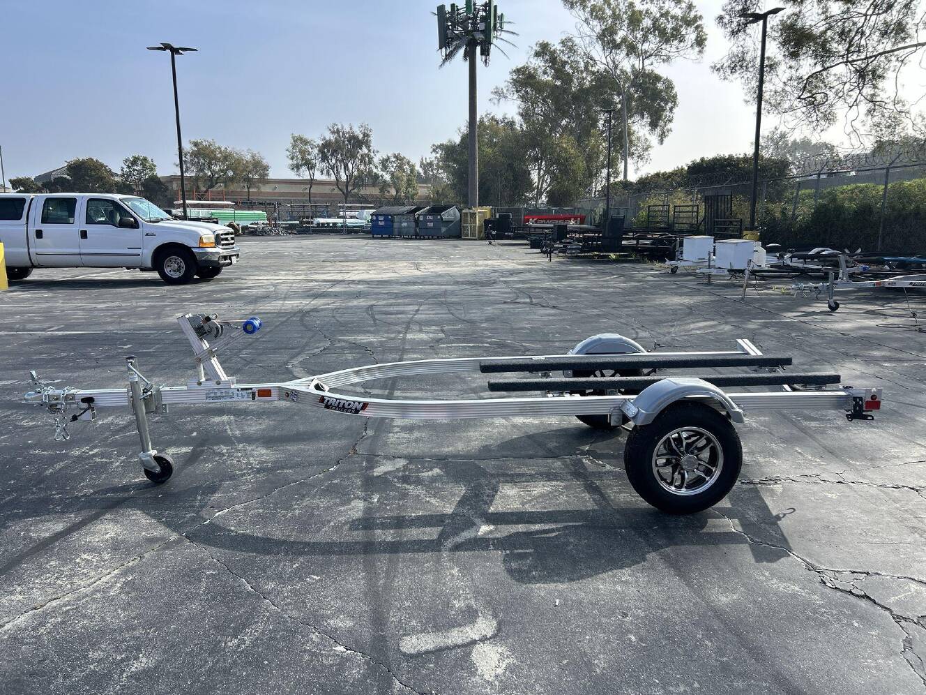 A photo of this 2026 Triton ELITE WCI PWC TRAILER W&sol; ALUMINUM WHEELS