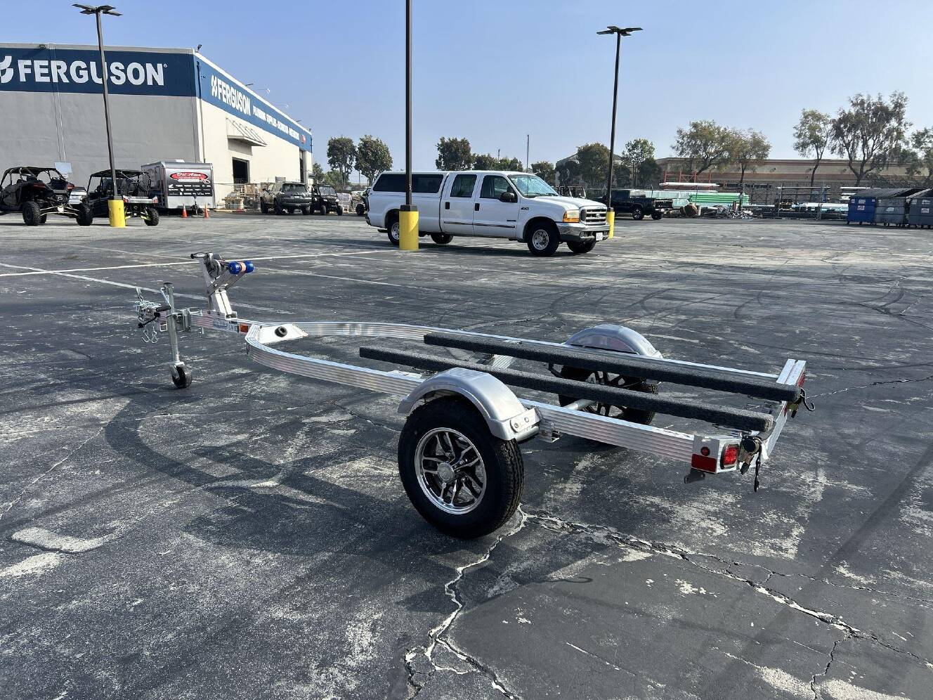 A photo of this 2026 Triton ELITE WCI PWC TRAILER W&sol; ALUMINUM WHEELS